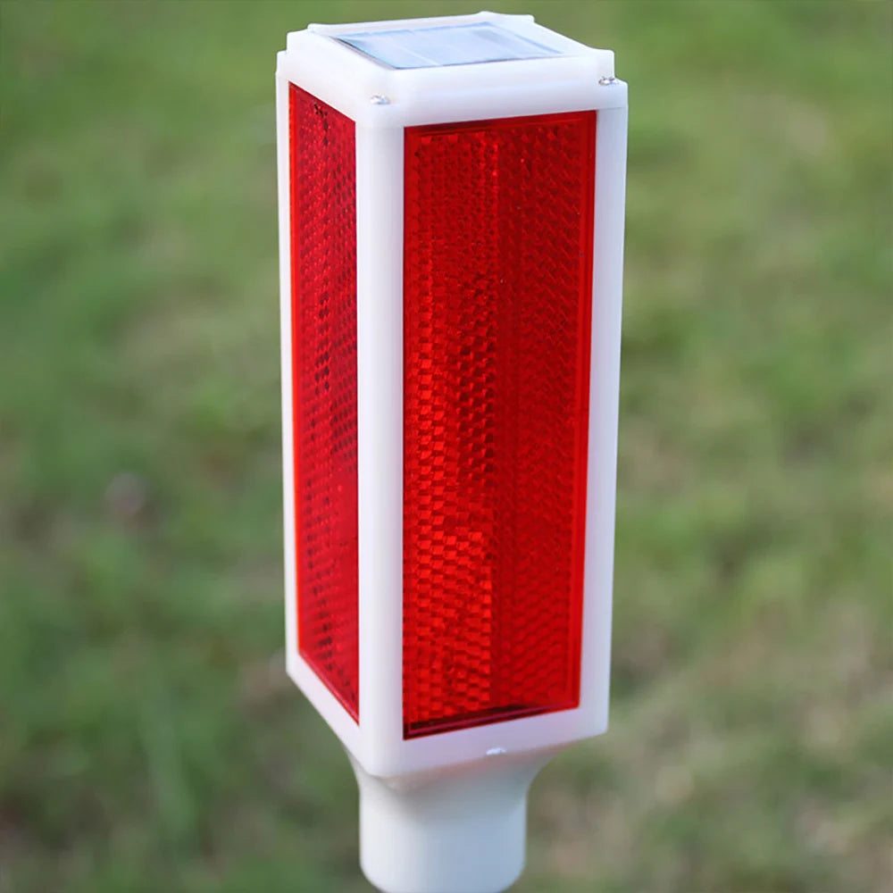 Solar powered bollard lights with multiple color and lighting mode options.,Suitable for driveways, gardens, and paths.