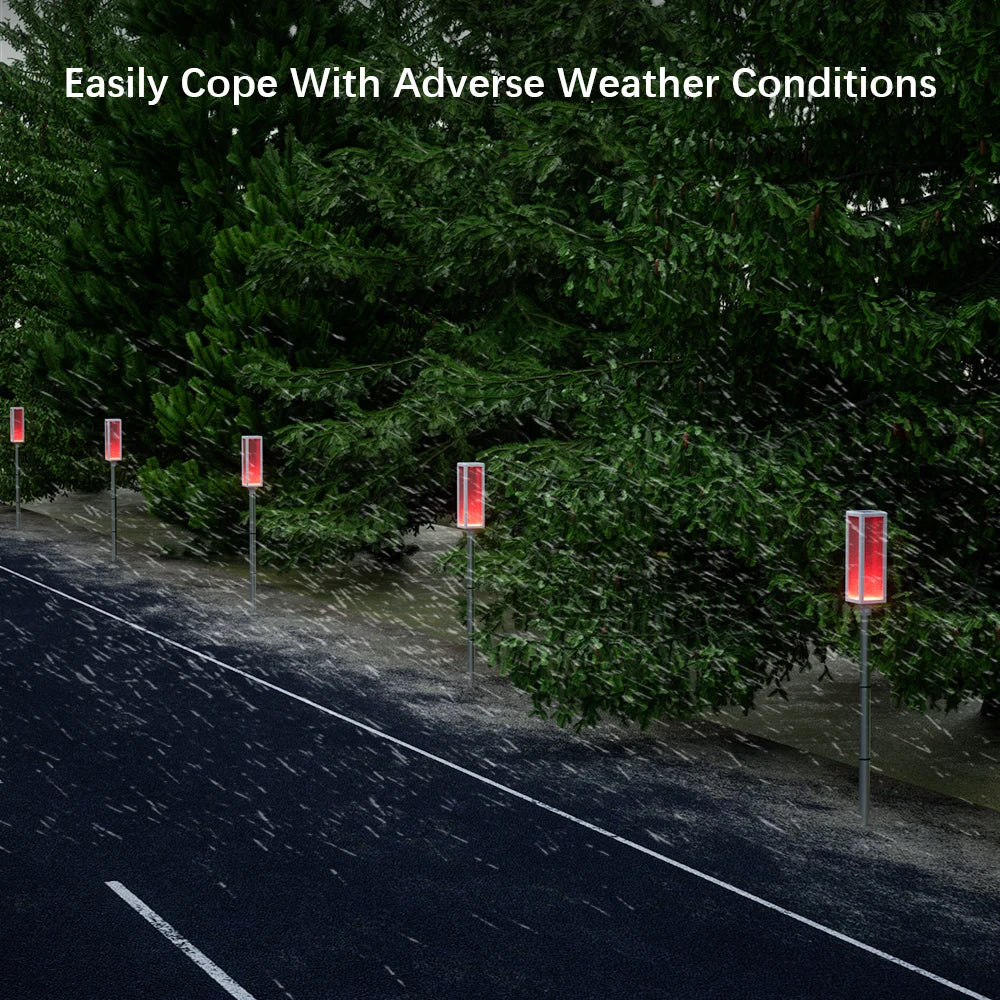 Solar powered bollard lights with multiple color and lighting mode options.，Suitable for driveways, gardens, and paths.