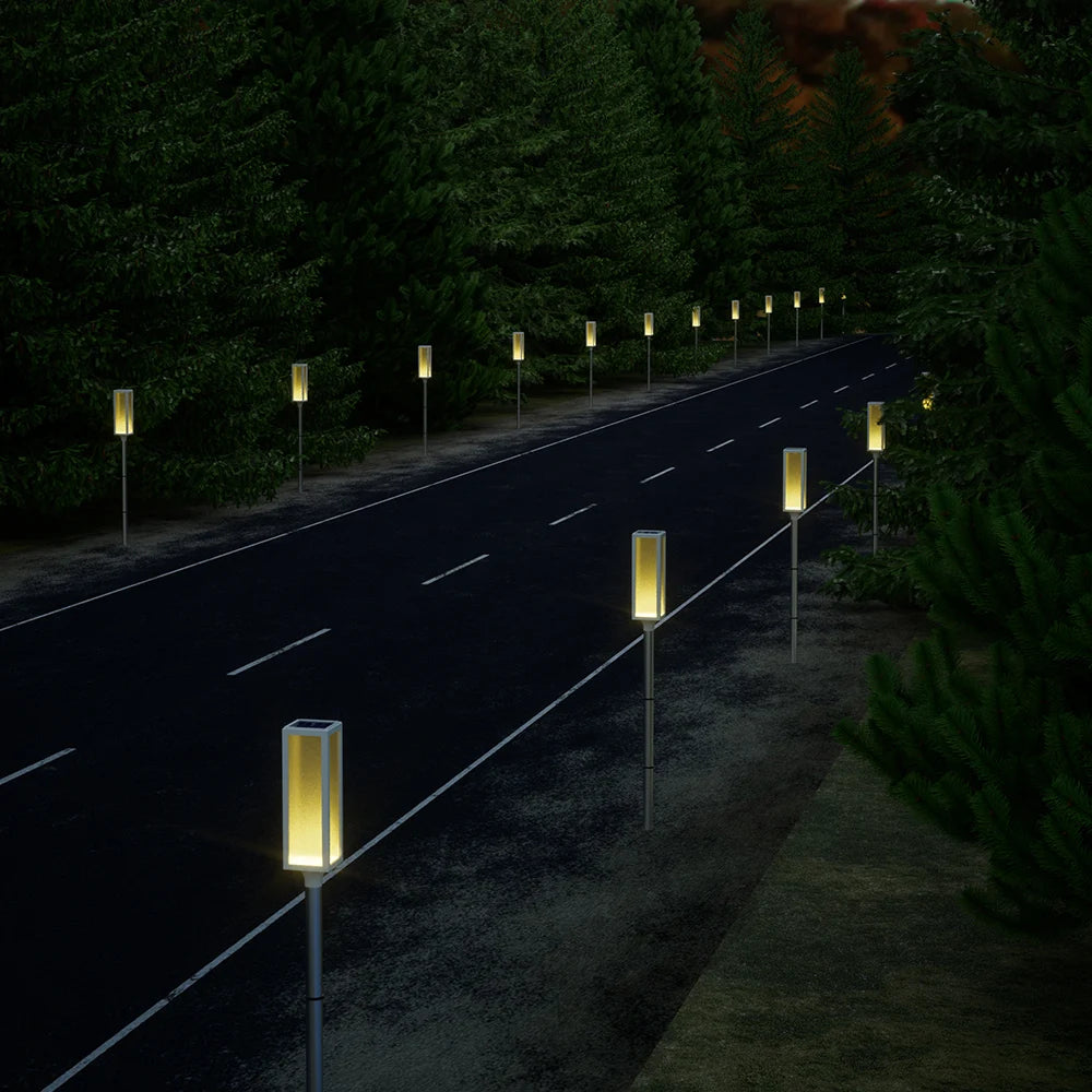 Solar powered bollard lights with multiple color and lighting mode options.，Suitable for driveways, gardens, and paths.