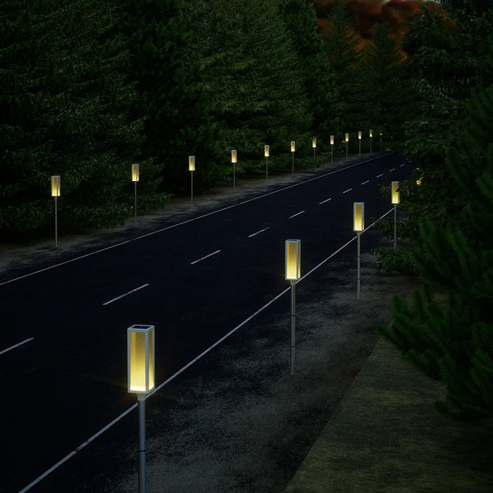 Solar powered bollard lights with multiple color and lighting mode options.，Suitable for driveways, gardens, and paths.