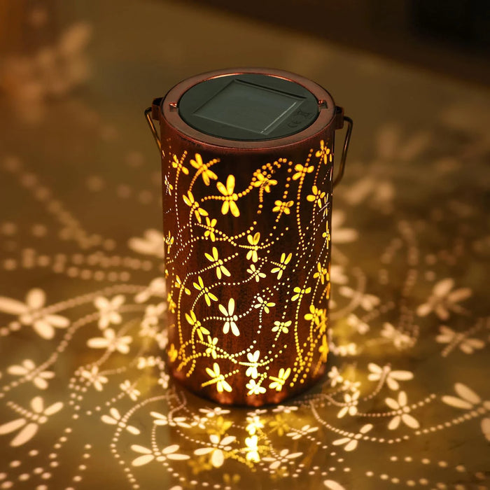 1 solar powered iron lantern, hollow design, suitable for outdoor gardens, terraces, party decorations and holiday gifts